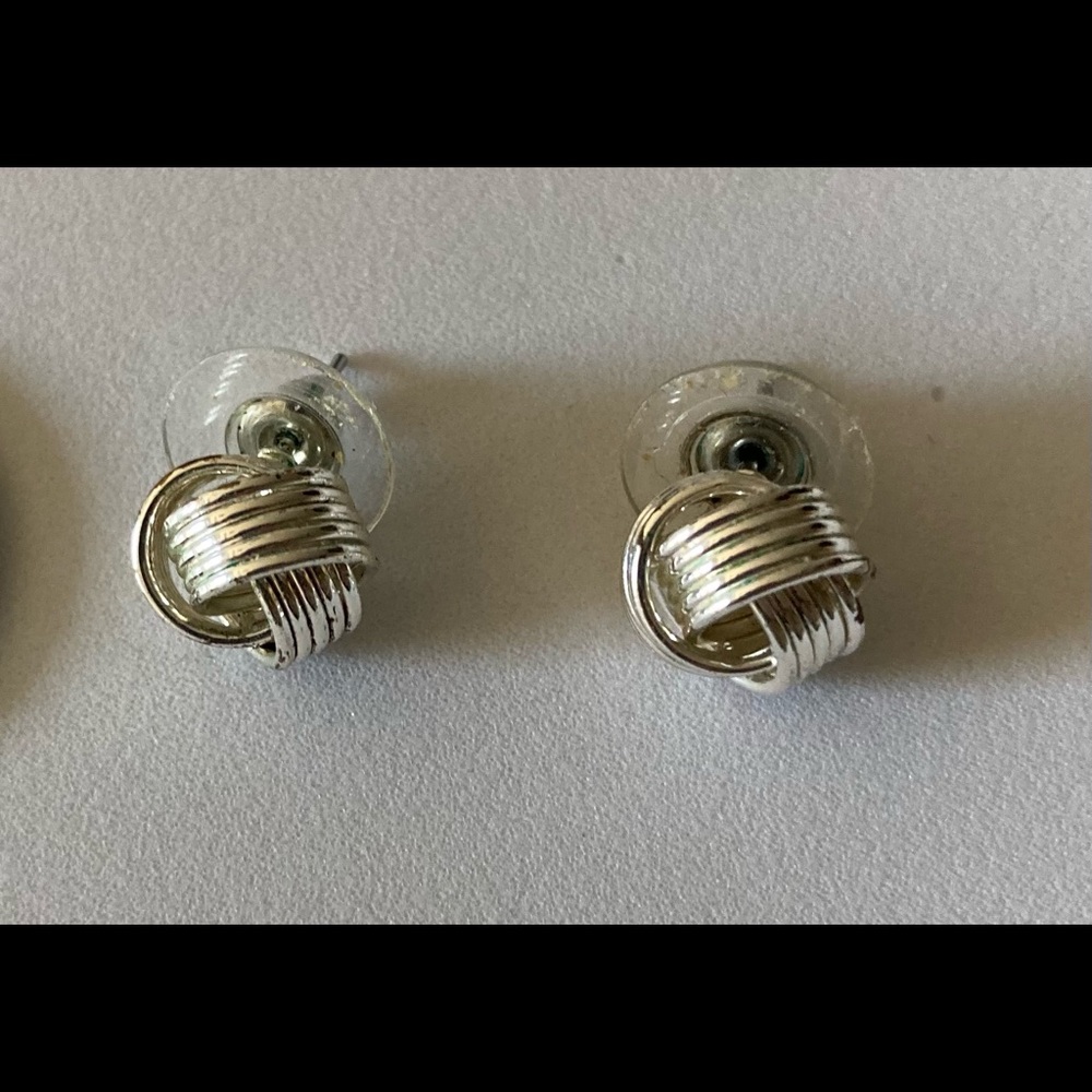 Love knot silver tone stud earrings